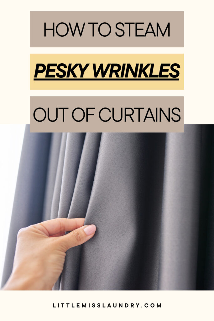 A hand gently pinching a dark gray curtain, with bold text above reading “How to steam pesky wrinkles out of curtains”